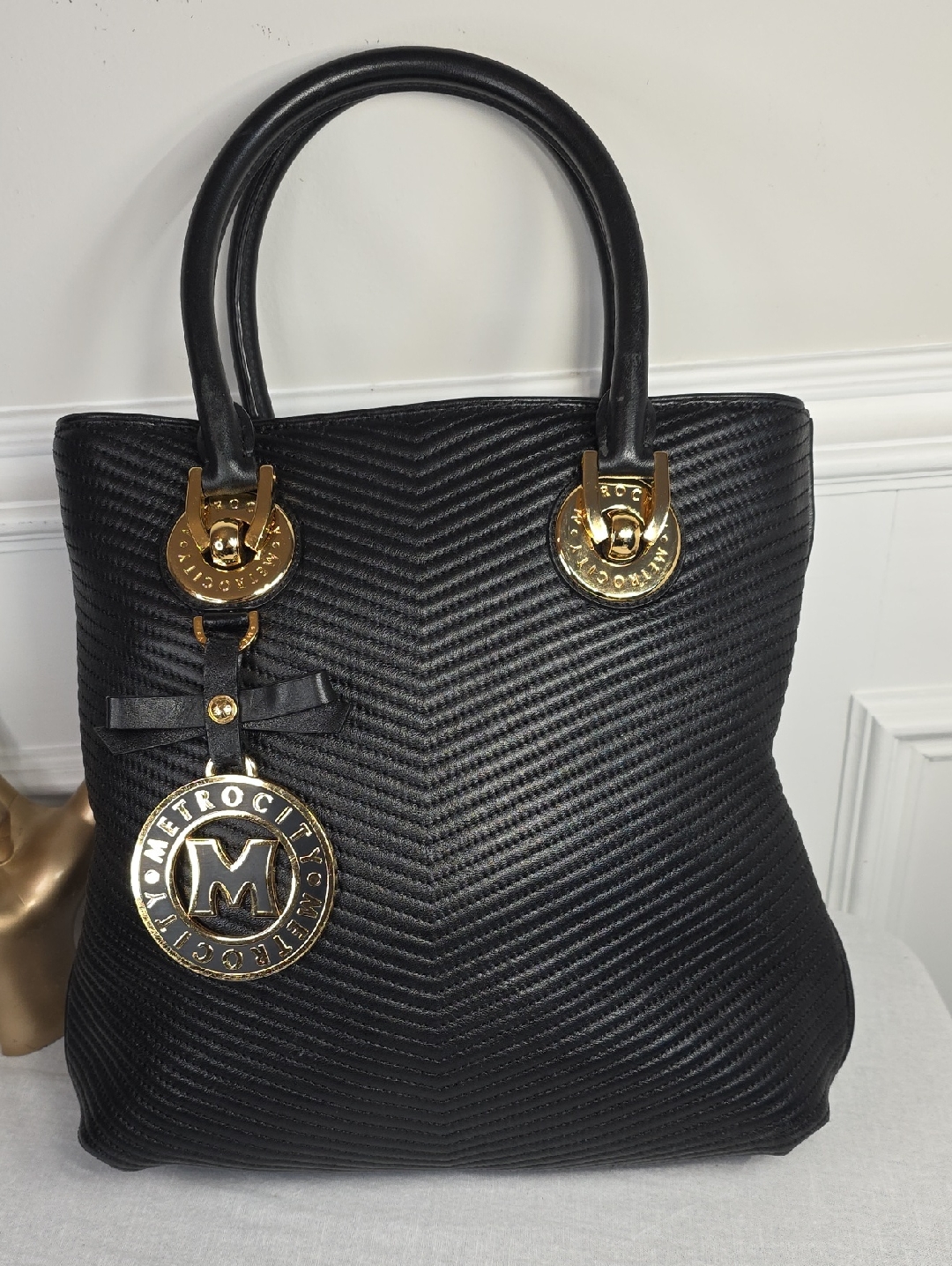 Metrocity Black Chevron Quilted Tote With Gold Medallion Charm